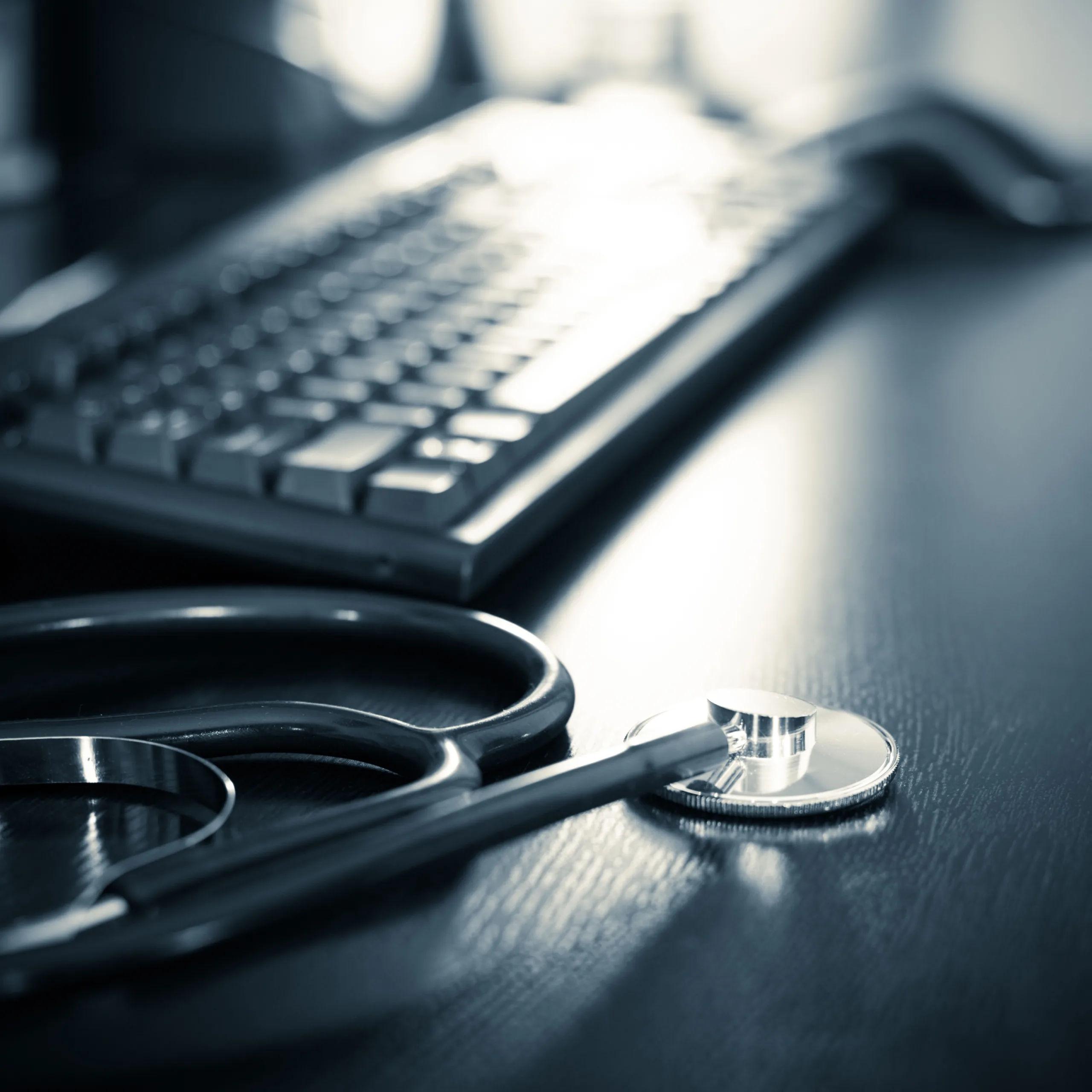 Healthcare professional using a keyboard