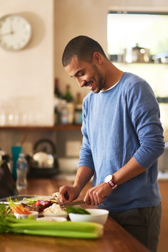 Man cooking healthy vegan food